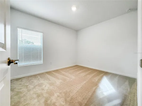 a view of a room with a window