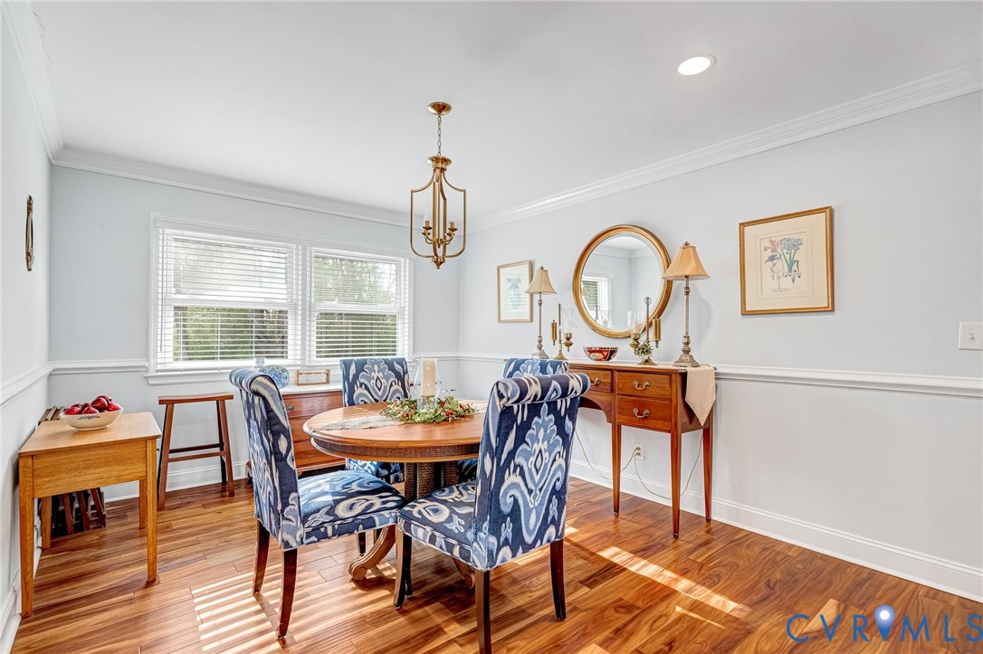 202 Bruce Road Tappahannock, VA 22560 - Photo 21 of 36 a view of a dining room with furniture window and wooden floor