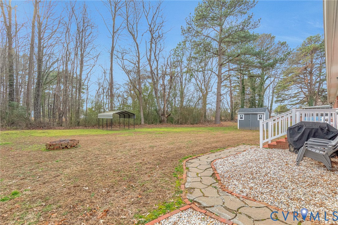 202 Bruce Road Tappahannock, VA 22560 - Photo 35 of 36 a view of a yard with basketball court