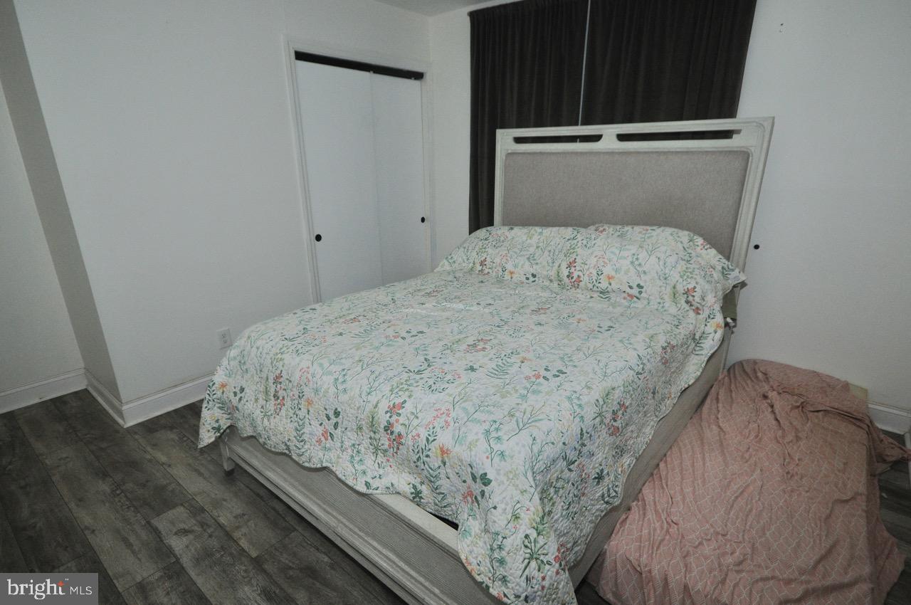 2413 Shelburn Road Millville, NJ 08332 - Photo 32 of 41 a bedroom with a bed and a window