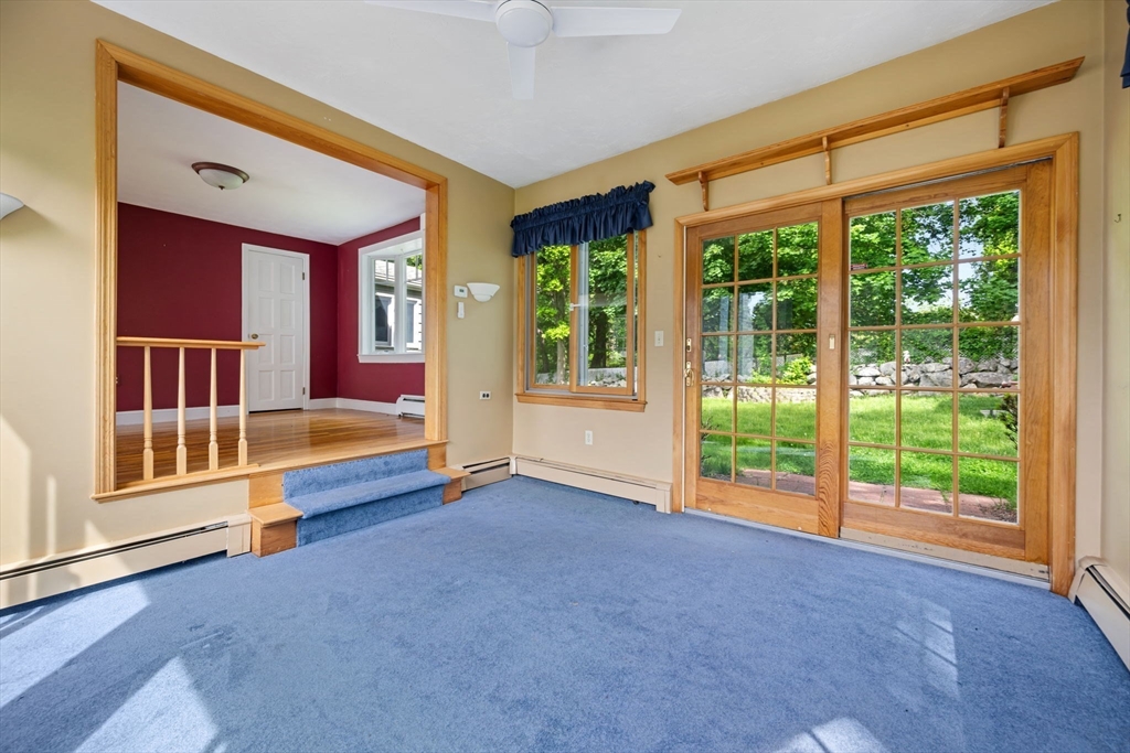 40 Bell Road Weymouth, MA 02188 - Photo 16 of 41 a view of an empty room with wooden floor and a window