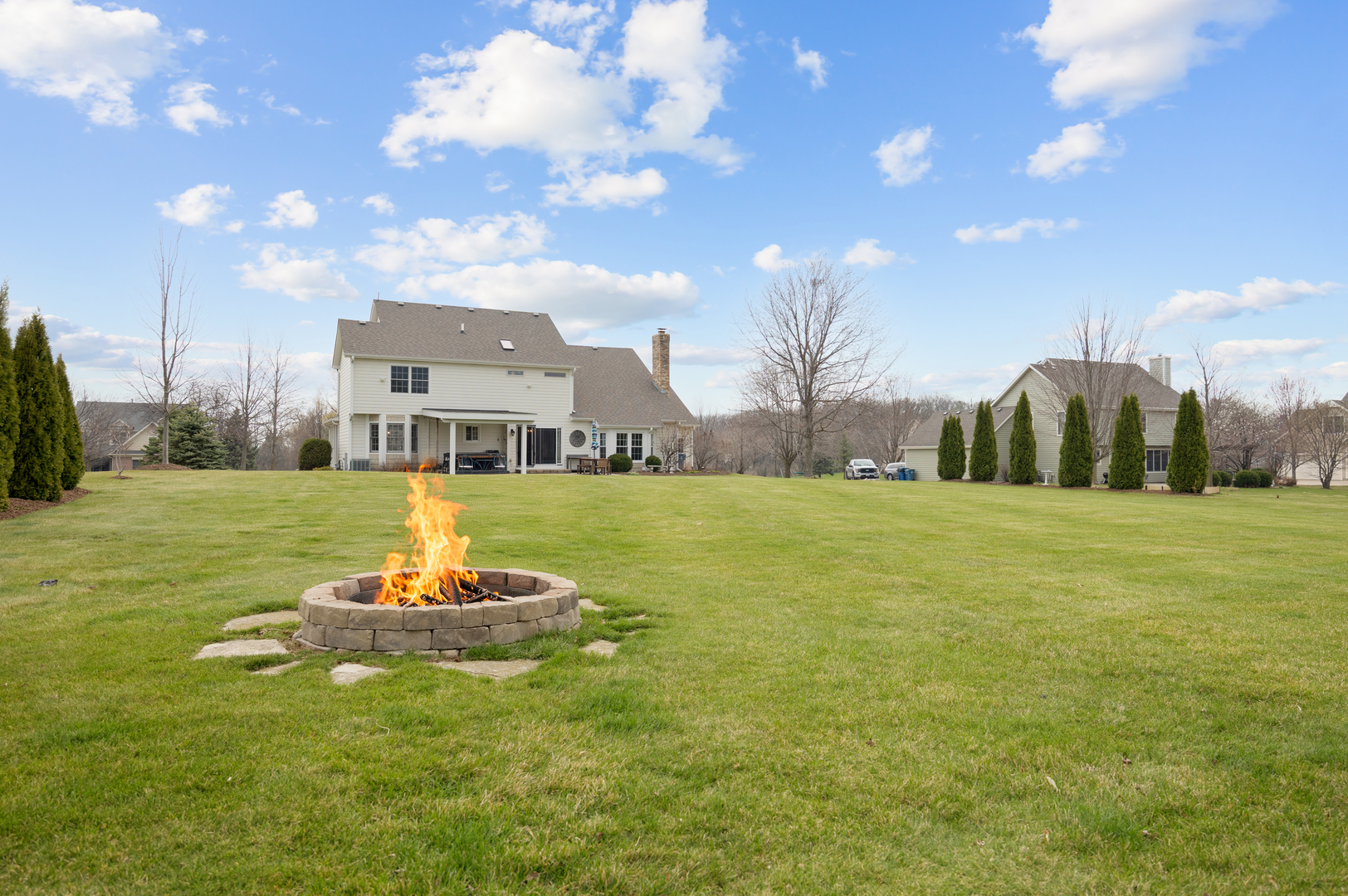 375 Meadow View Burlington, IL 60109 - Photo 7 of 9 a swimming pool with outdoor seating and yard