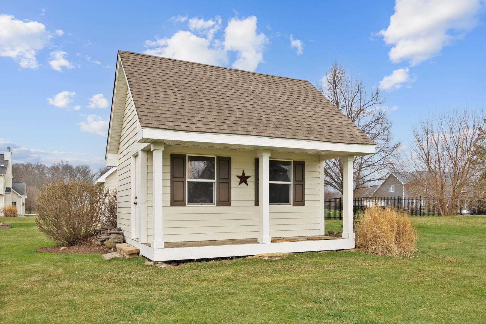 375 Meadow View Burlington, IL 60109 - Photo 8 of 9 a front view of a house with a yard