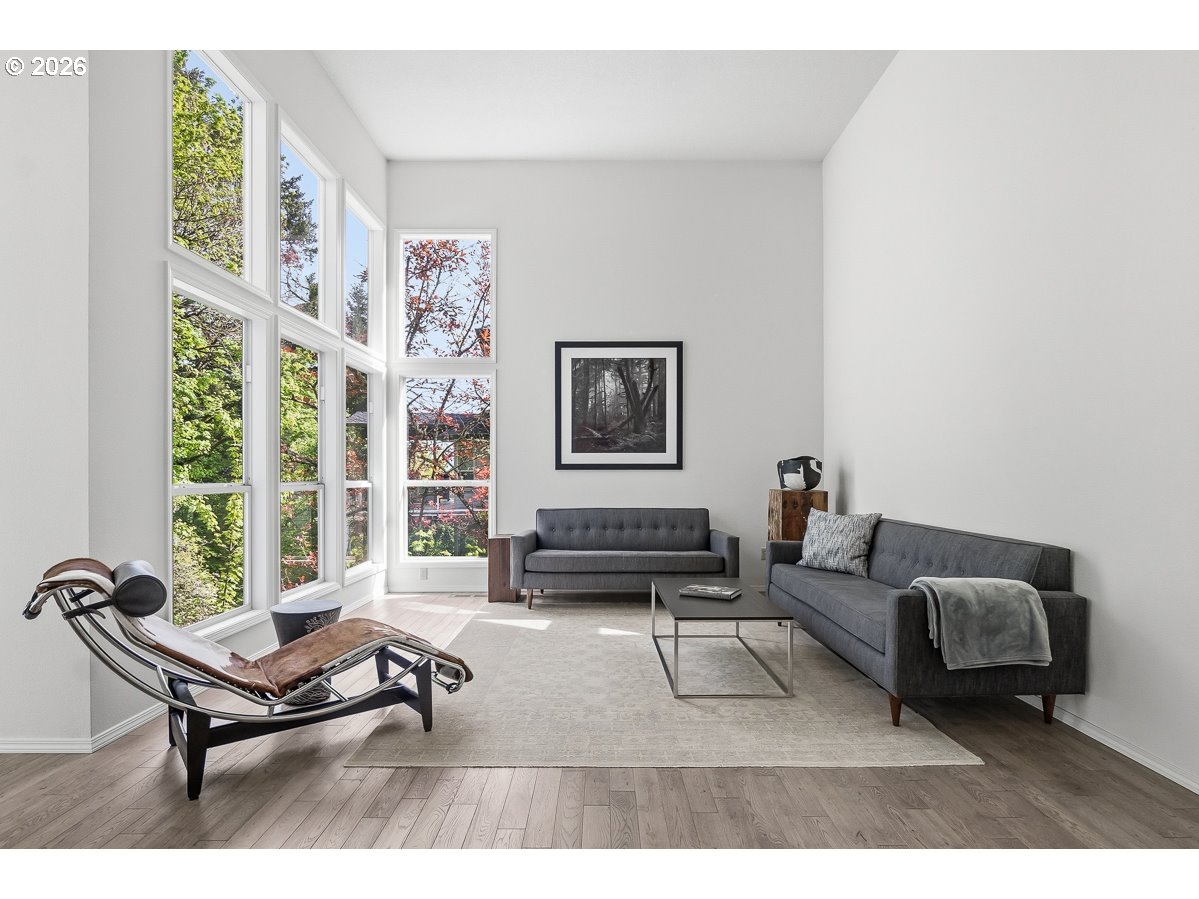 9675 Southwest 163rd Avenue Beaverton, OR 97007 - Photo 5 of 26 a living room with furniture a rug and a large window