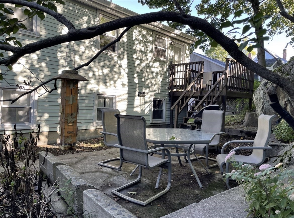 9 Grove Terrace, Unit 2 Boston, MA 02132 - Photo 8 of 8 a view of backyard with sitting area
