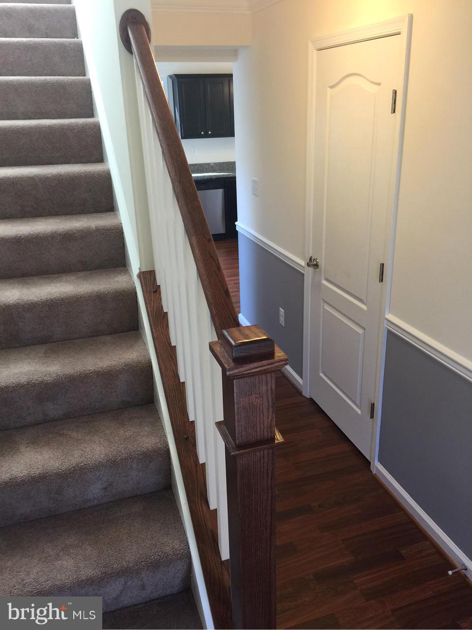 2312 Lodge Farm Road Baltimore, MD 21219 - Photo 11 of 23 chair rail in hallway