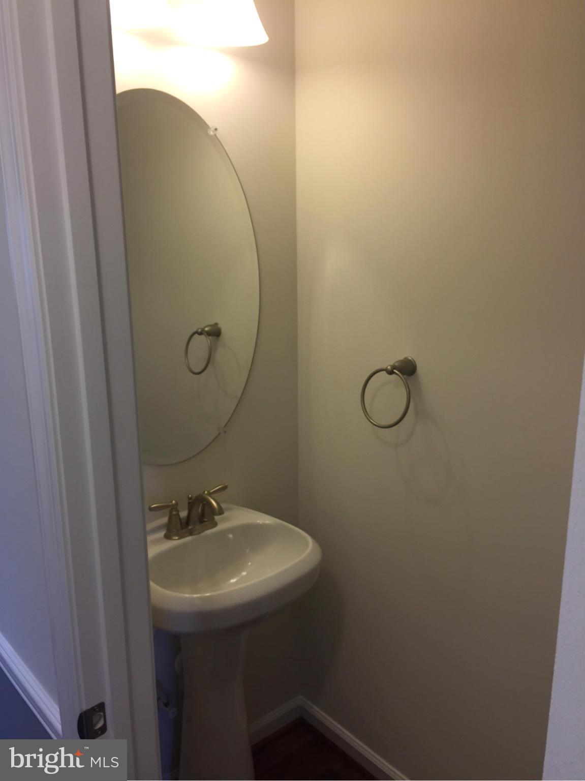 2312 Lodge Farm Road Baltimore, MD 21219 - Photo 12 of 23 powder room on main level