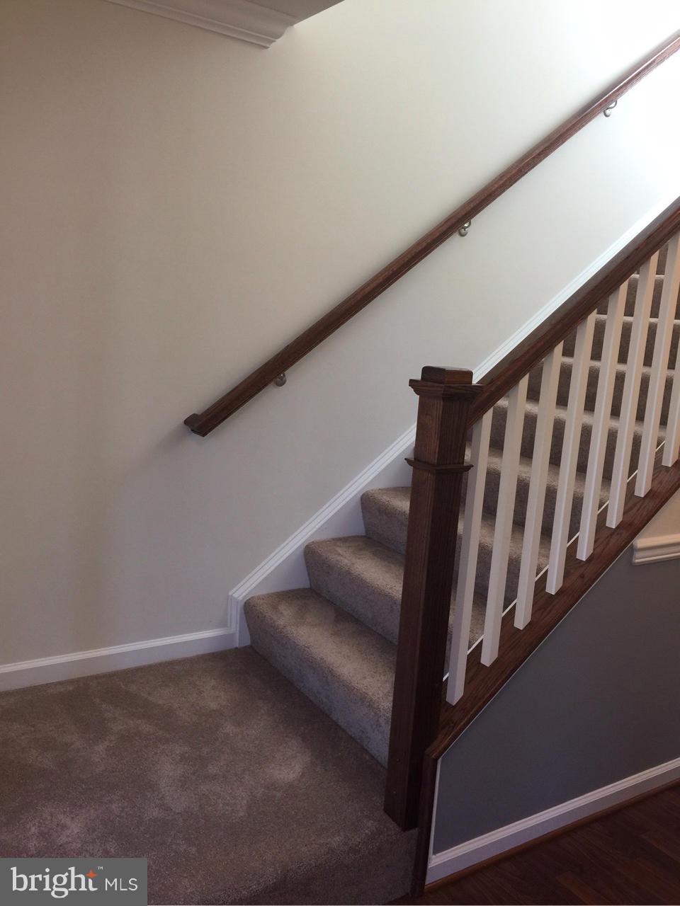 2312 Lodge Farm Road Baltimore, MD 21219 - Photo 16 of 23 oak railing