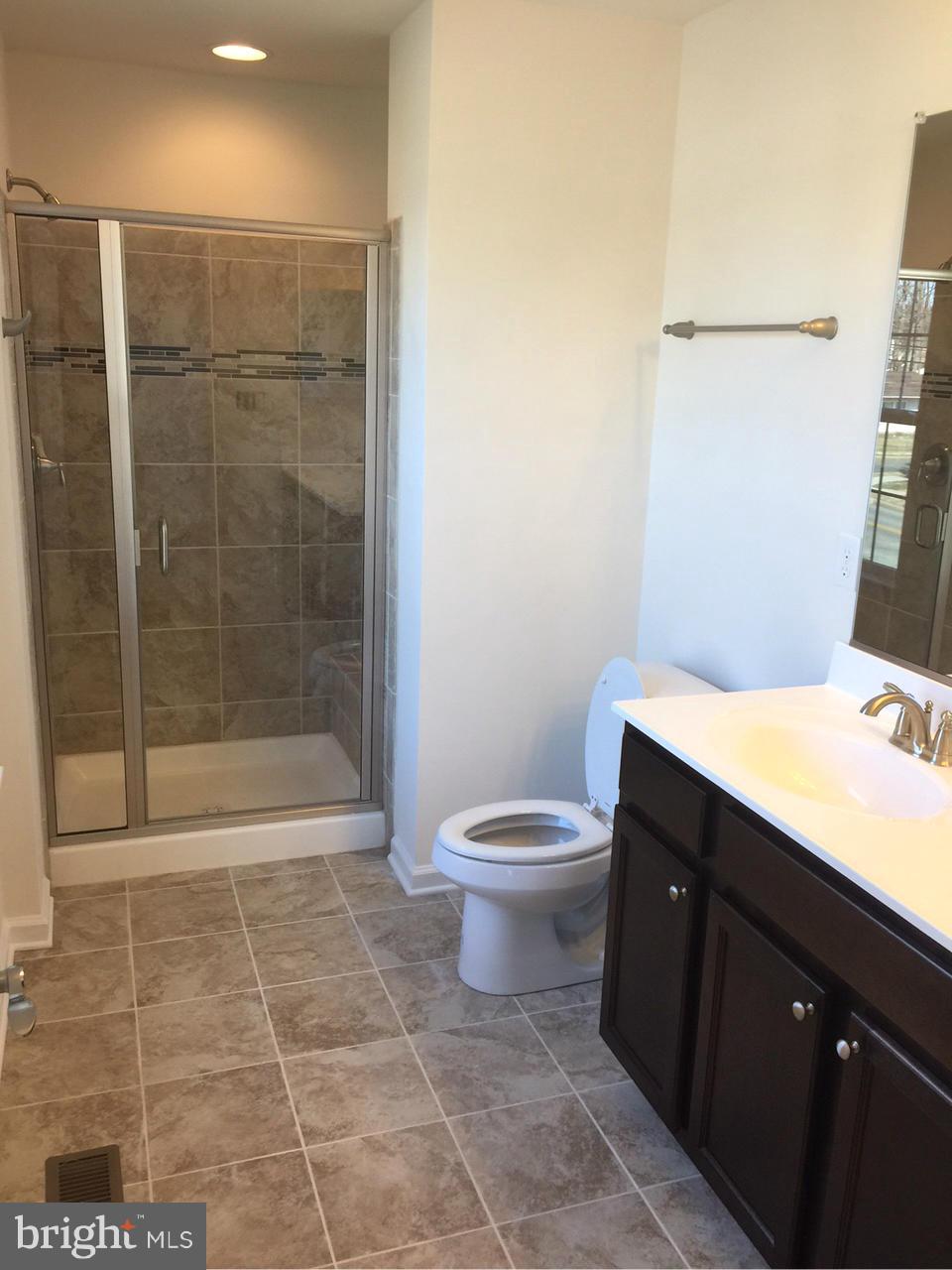 2312 Lodge Farm Road Baltimore, MD 21219 - Photo 9 of 23 walk-in tiled shower