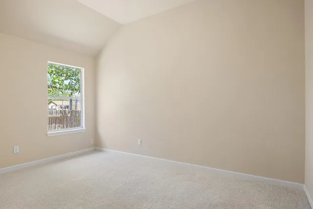 a view of a backyard with a garden