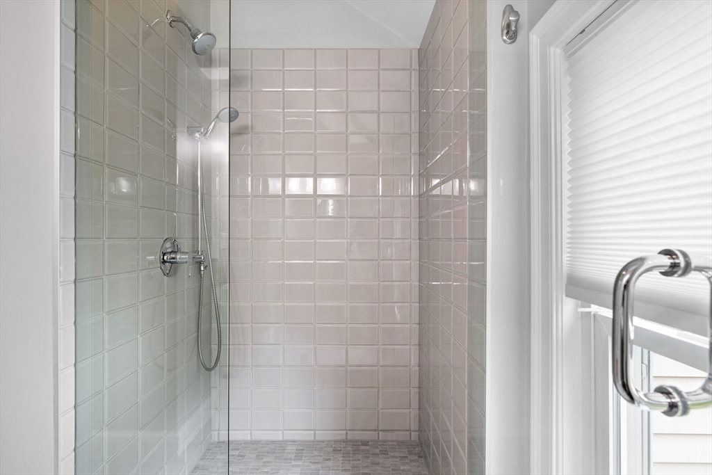 25 Clark Street, Unit 2 Somerville, MA 02143 - Photo 16 of 20 a bathroom with a glass shower door