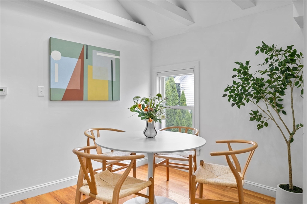 25 Clark Street, Unit 2 Somerville, MA 02143 - Photo 9 of 20 a dining room with furniture and wooden floor