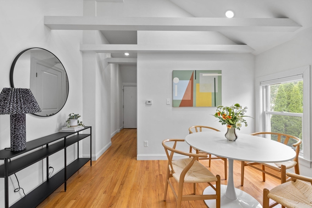 25 Clark Street, Unit 2 Somerville, MA 02143 - Photo 10 of 20 a dining room with furniture and wooden floor