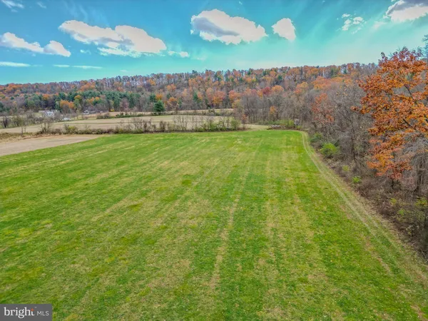 a view of yard with swimming pool and mountain view
