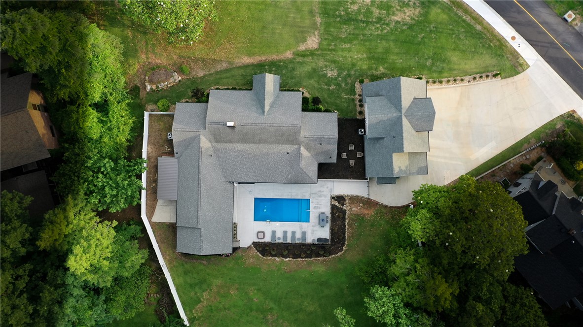 103 Riggs Drive Clemson, SC 29631 - Photo 47 of 50 An aerial perspective reveals a private swimming pool, inviting patios, and a spacious concrete driveway.