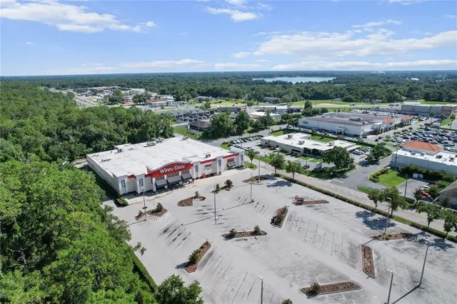 a view of a swimming pool with sitting area