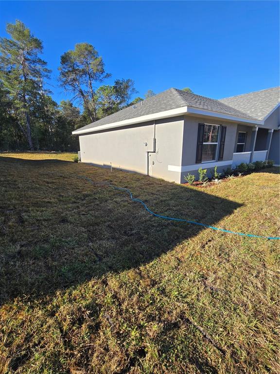 2605 Clearwood Street Inverness, FL 34452 - Photo 5 of 21 a view of a house with a yard
