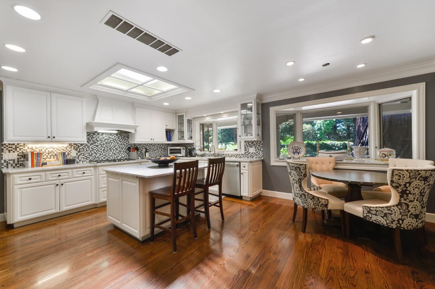 261 Atherton Avenue Atherton, CA 94027 - Photo 11 of 49 a kitchen with a sink cabinets and wooden floor