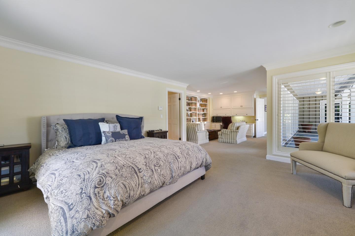 261 Atherton Avenue Atherton, CA 94027 - Photo 17 of 49 a bedroom with a large bed and furniture