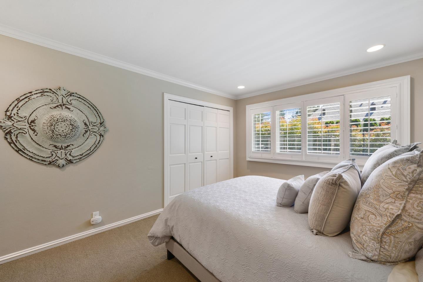 261 Atherton Avenue Atherton, CA 94027 - Photo 20 of 49 a bedroom with a bed and a window