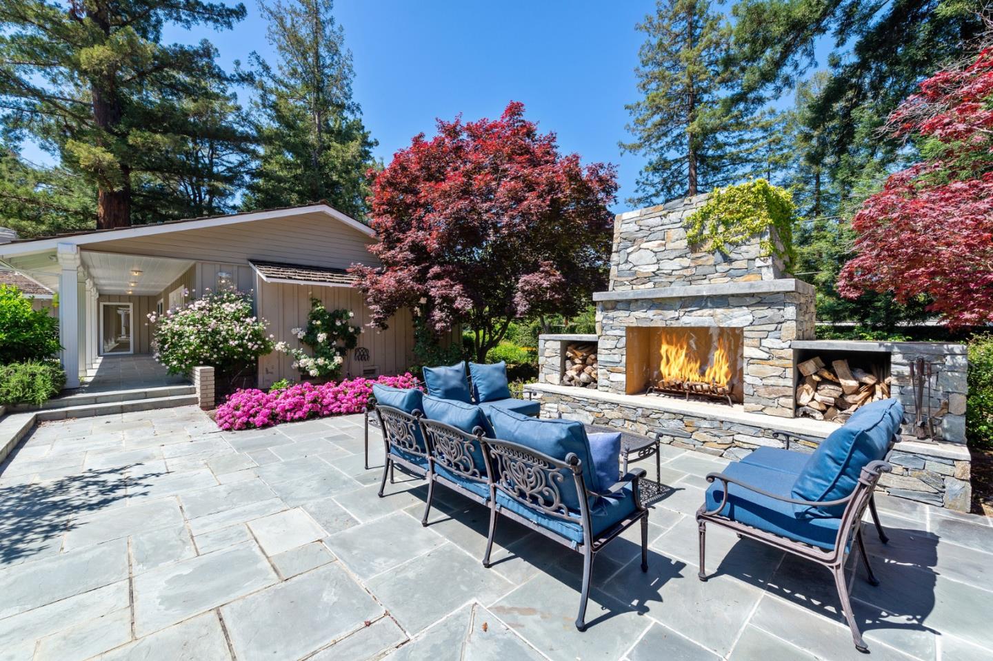 261 Atherton Avenue Atherton, CA 94027 - Photo 37 of 49 a view of a patio with couches table and chairs and potted plants
