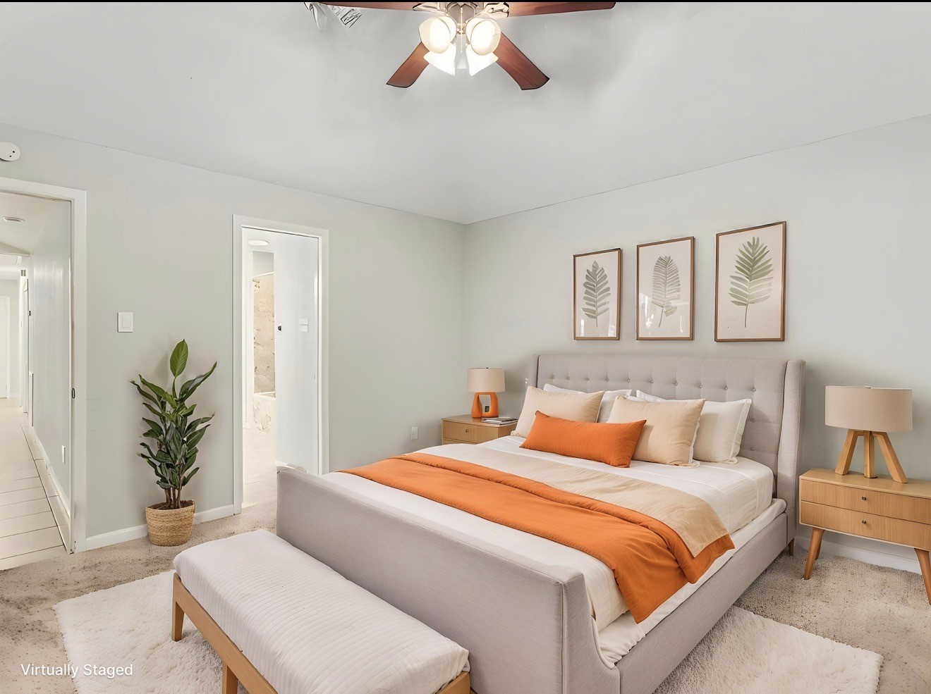 2450 Blackridge Road Houston, TX 77067 - Photo 11 of 21 a bedroom with a large bed and a potted plant