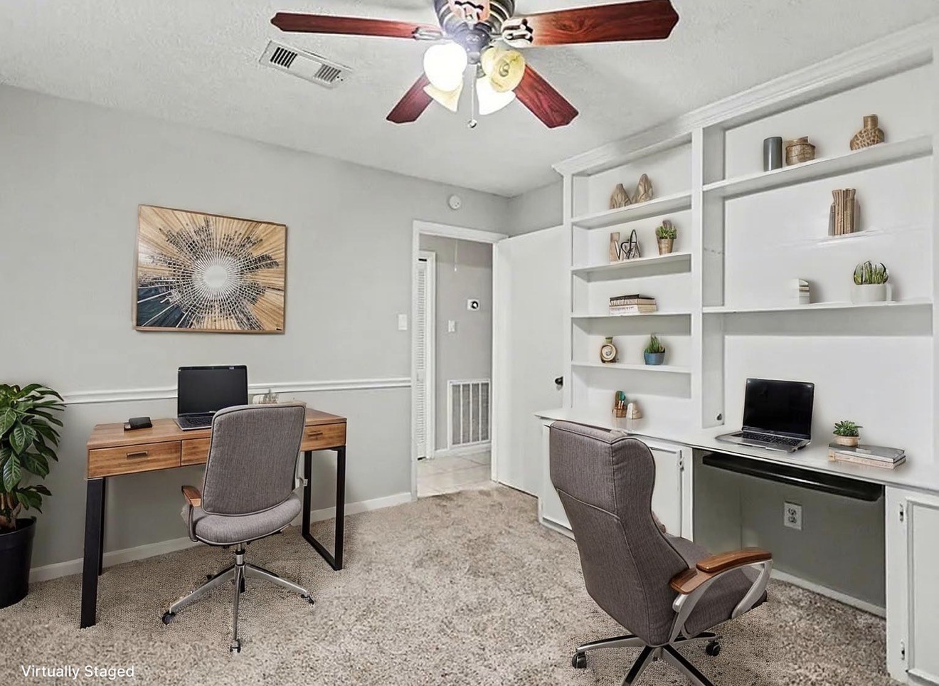 2450 Blackridge Road Houston, TX 77067 - Photo 15 of 21 a view of a workspace with furniture and a window