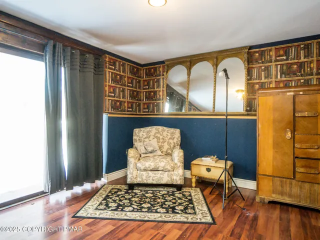 a front view of a house with wooden floor