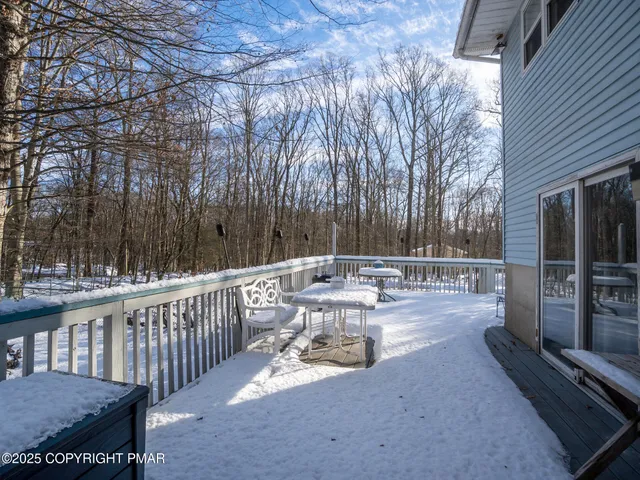a view of a patio with a yard