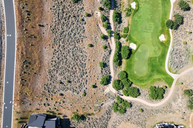 2712 East Boulder Top Loop, Unit 583 Heber City, UT 84032 - Photo 16 of 17 Aerial perspective showcasing a verdant golf course with sand traps and cart paths