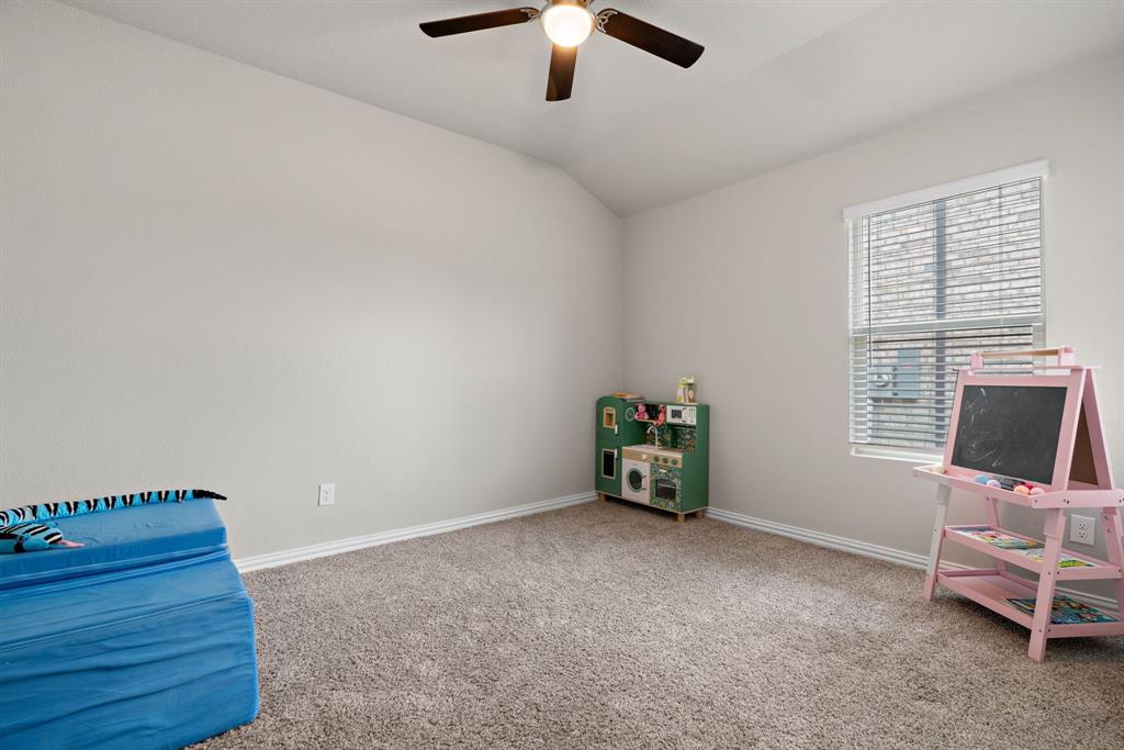 3112 Kingsgarden Road Denton, TX 76207 - Photo 22 of 38 Carpeted room featuring a ceiling fan with integrated lighting, a window with blinds, and neutral painted walls