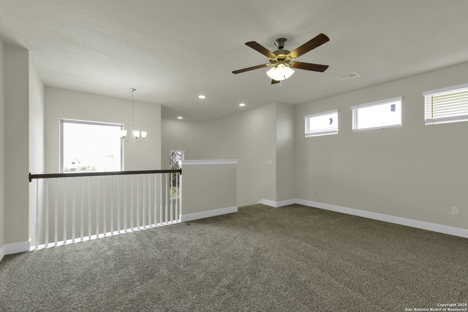 945 Foxbrook Way Cibolo, TX 78108 - Photo 13 of 20 a view of a livingroom with a ceiling fan and window