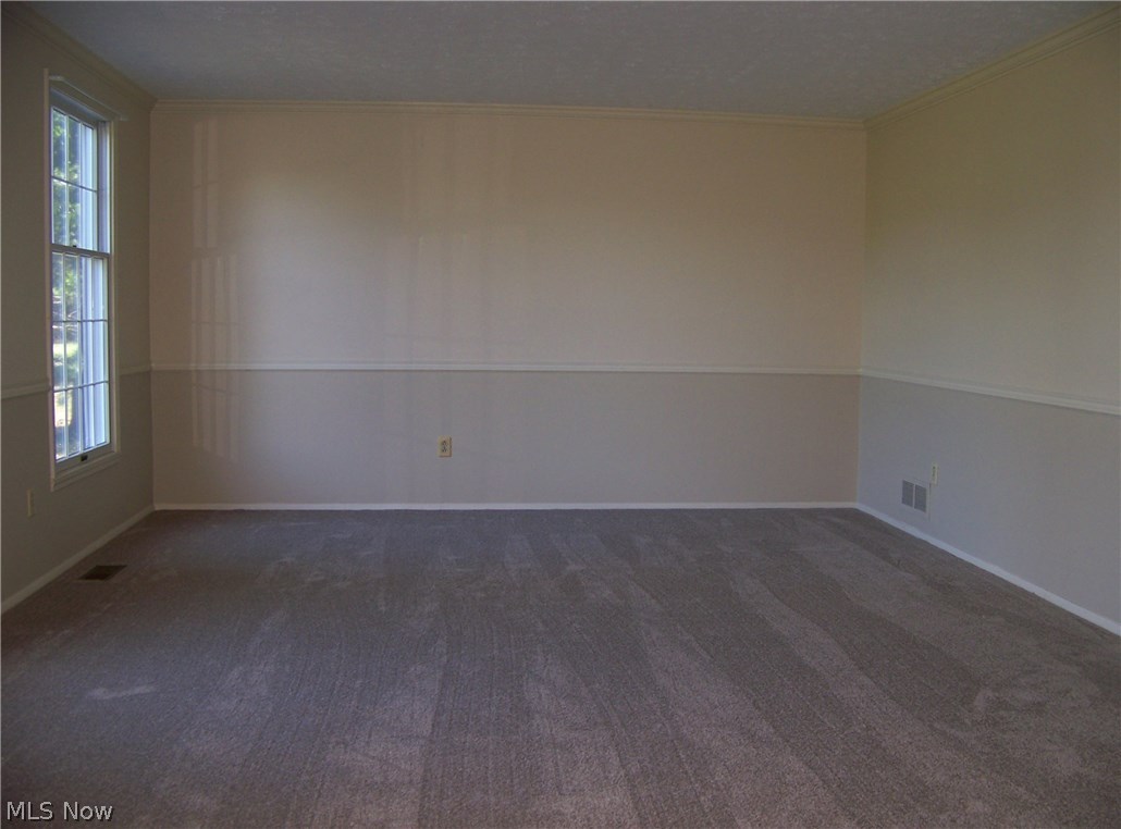 4086 Fenn Road Medina, OH 44256 - Photo 3 of 24 Living room - newer carpet (08/16), chair rail & crown molding