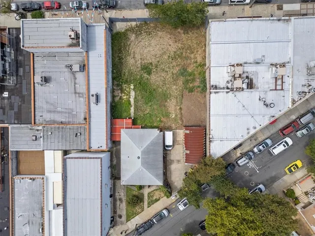 aerial view of a house with outdoor space