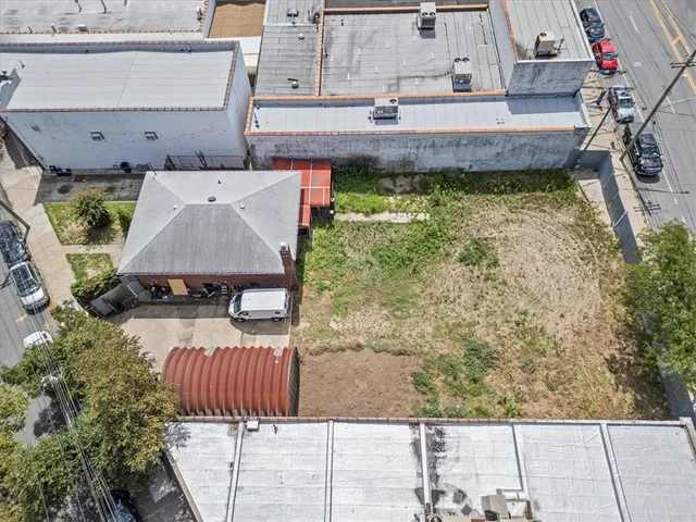 a view of swimming pool with an outdoor seating