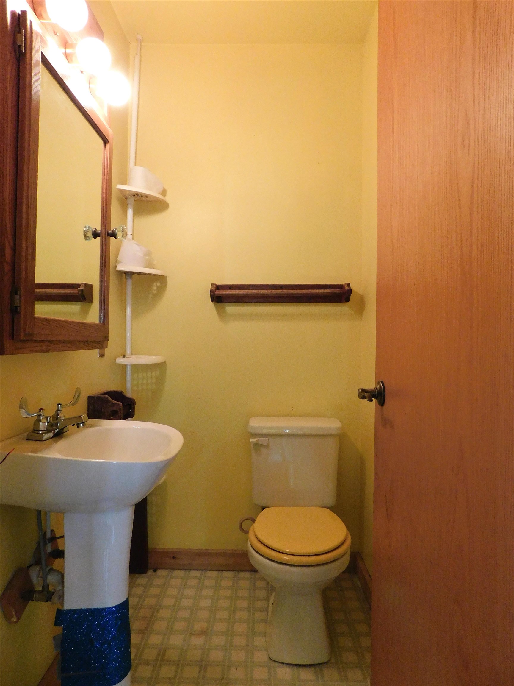 4036 County Rd A Superior, WI 54880 - Photo 16 of 52 Half bath featuring toilet and baseboards