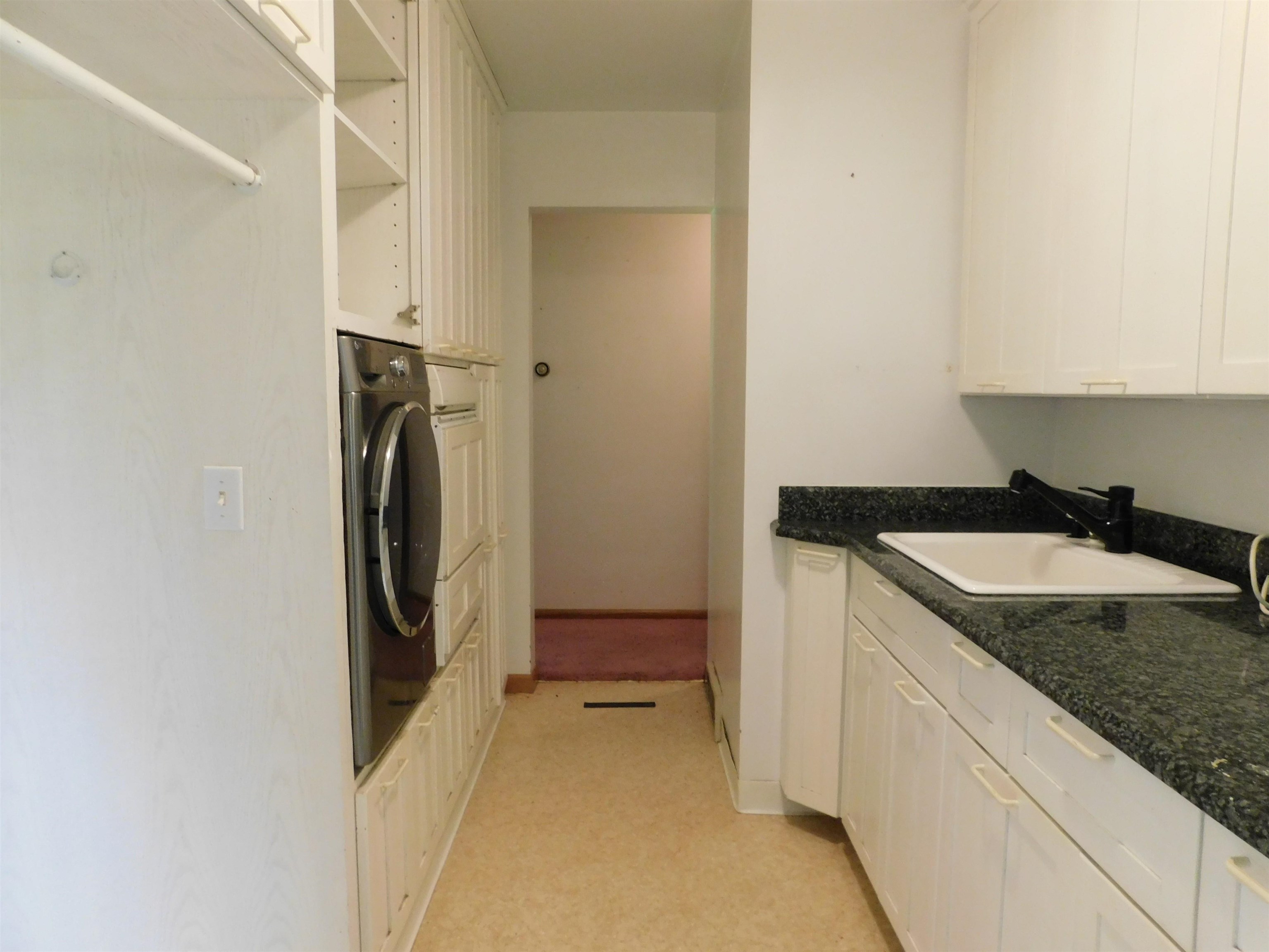4036 County Rd A Superior, WI 54880 - Photo 28 of 52 Laundry room with washer / clothes dryer and cabinet space