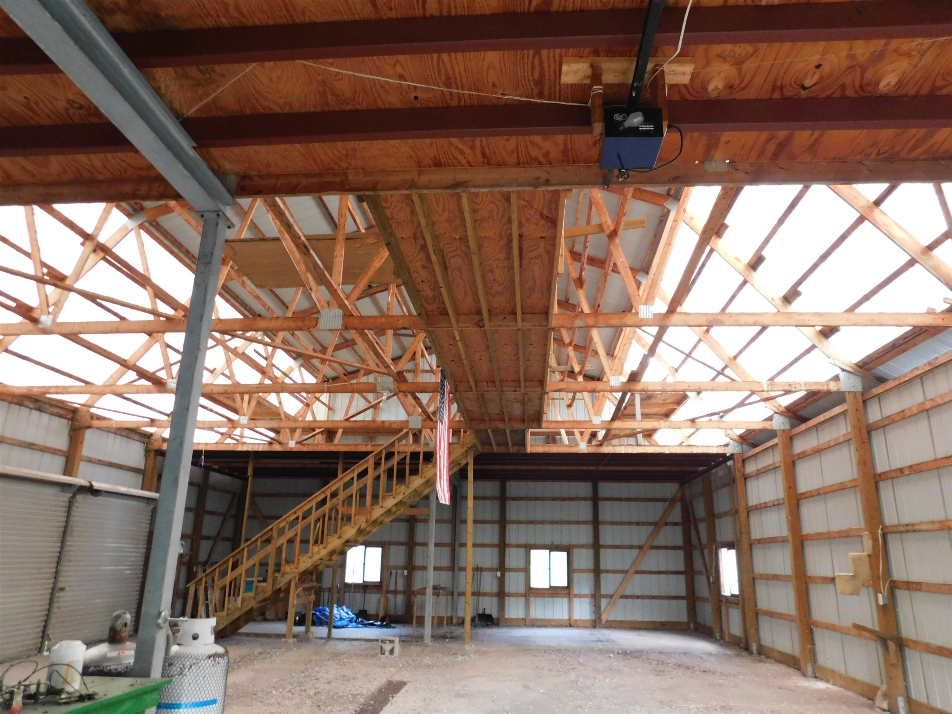 4036 County Rd A Superior, WI 54880 - Photo 45 of 52 Garage with metal wall and a garage door opener