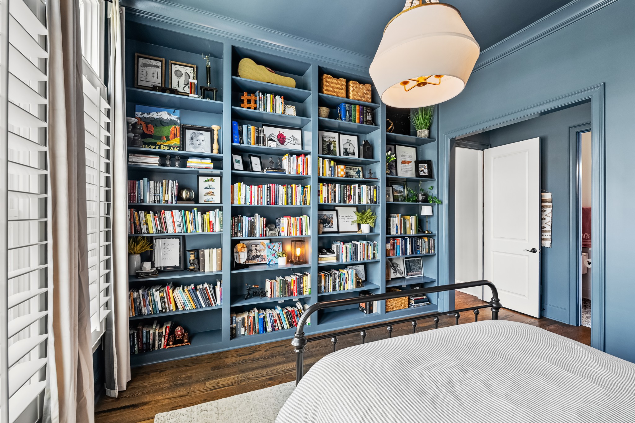 3013 Conar Street Franklin, TN 37064 - Photo 14 of 62 a bedroom with a bed and a book shelf