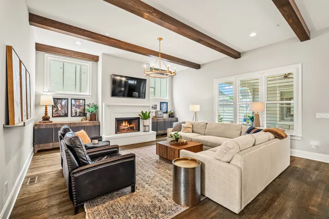 a kitchen with stainless steel appliances white cabinets and a sink