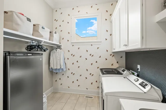 a bath room with a bath tub and a shower