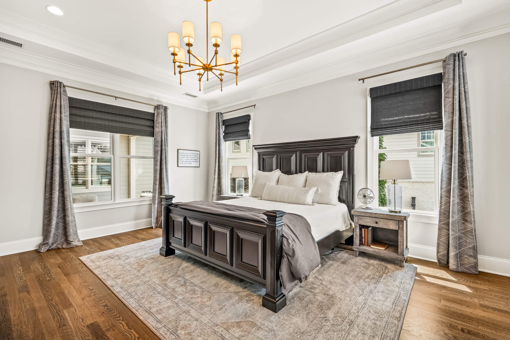 3013 Conar Street Franklin, TN 37064 - Photo 27 of 62 a spacious bedroom with a bed and a chandelier