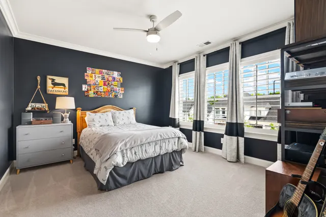 a view of a house with a fence