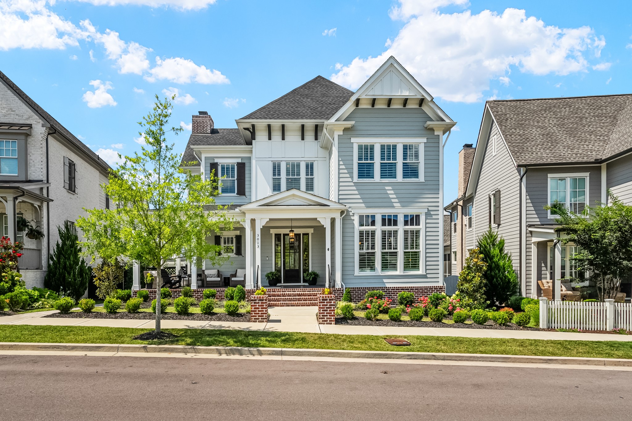 3013 Conar Street Franklin, TN 37064 - Photo 59 of 62 a front view of a house with a garden and plants