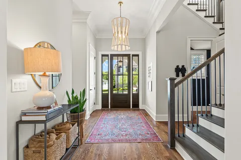 a bedroom with a bed and a book shelf
