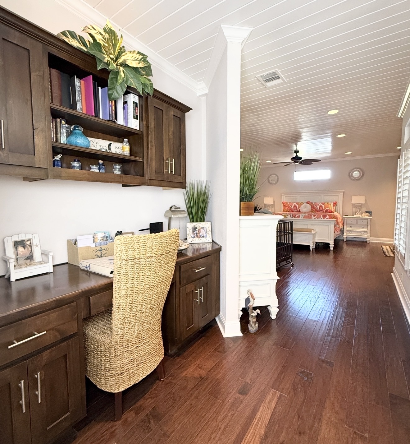 1902 Rowe Loop Pflugerville, TX 78660 - Photo 17 of 38 1st Master retreat Office with built in study area, dark wood-style flooring, and crown molding