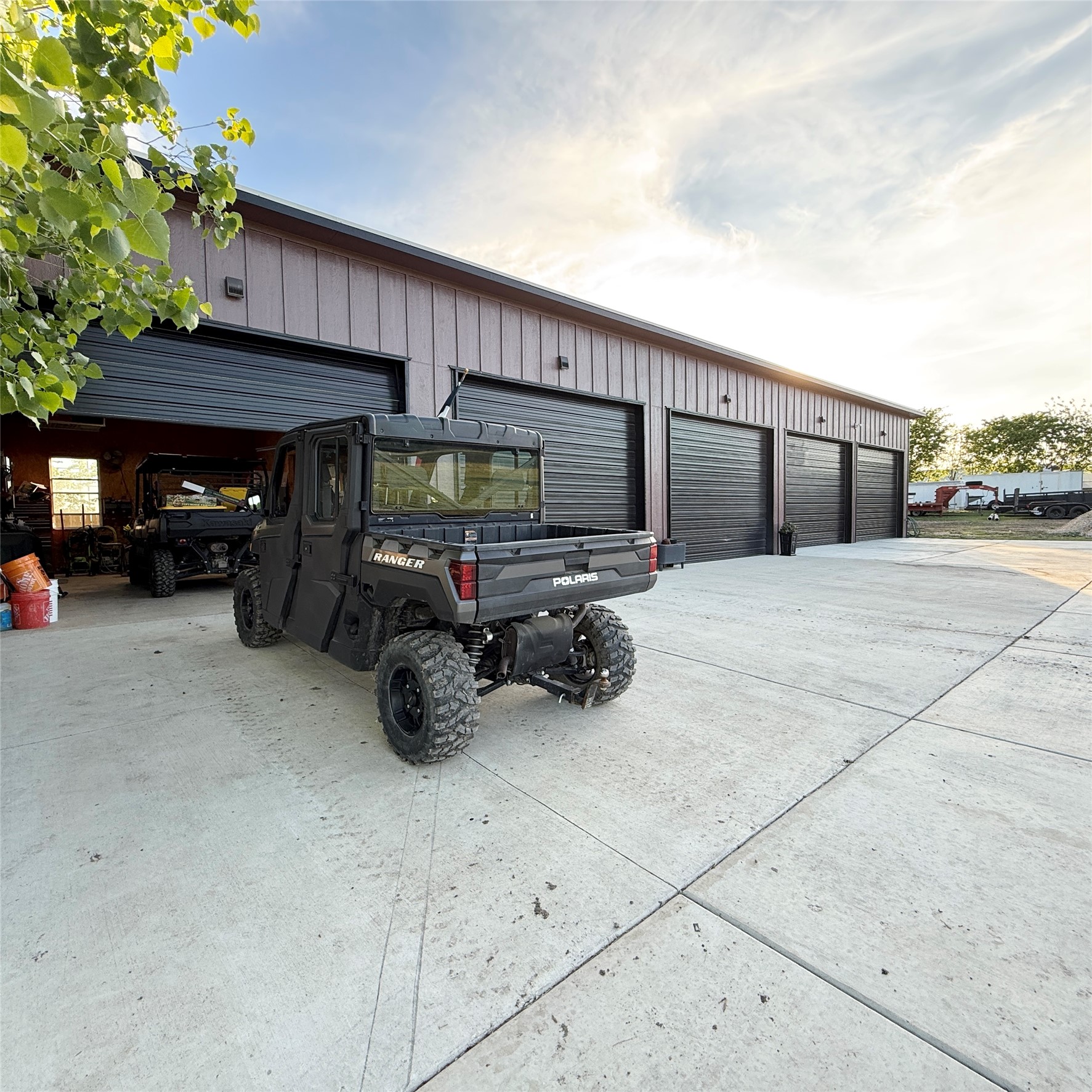 1902 Rowe Loop Pflugerville, TX 78660 - Photo 34 of 38 View of 5 bay garage. 1 of 3 garages/workshops