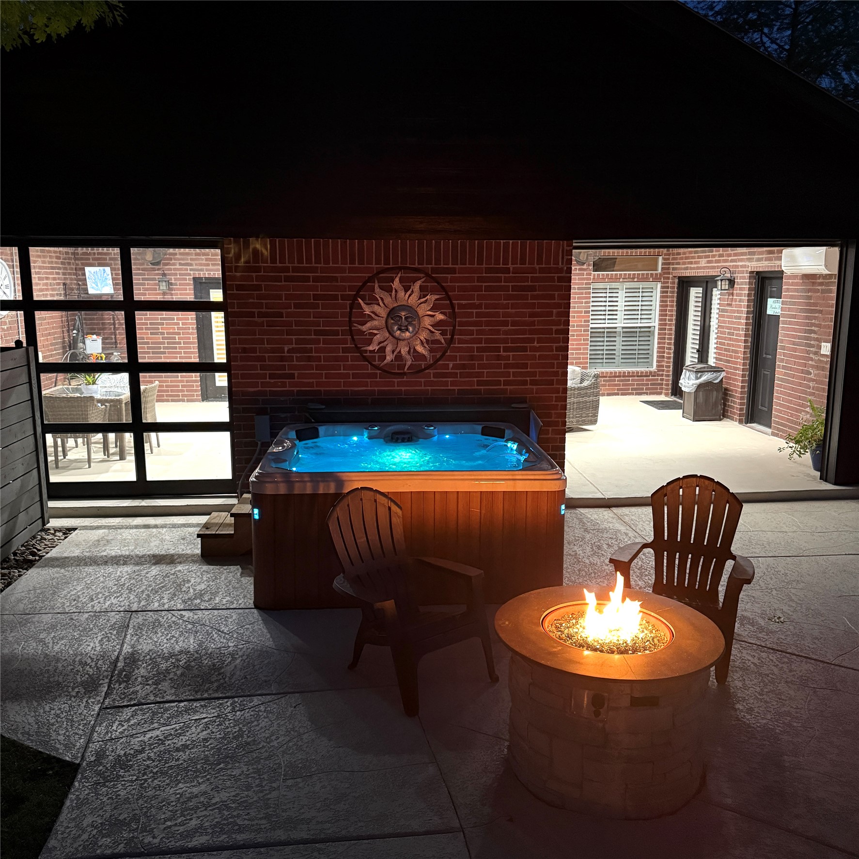 1902 Rowe Loop Pflugerville, TX 78660 - Photo 37 of 38 View of patio with a hot tub and an outdoor fire pit