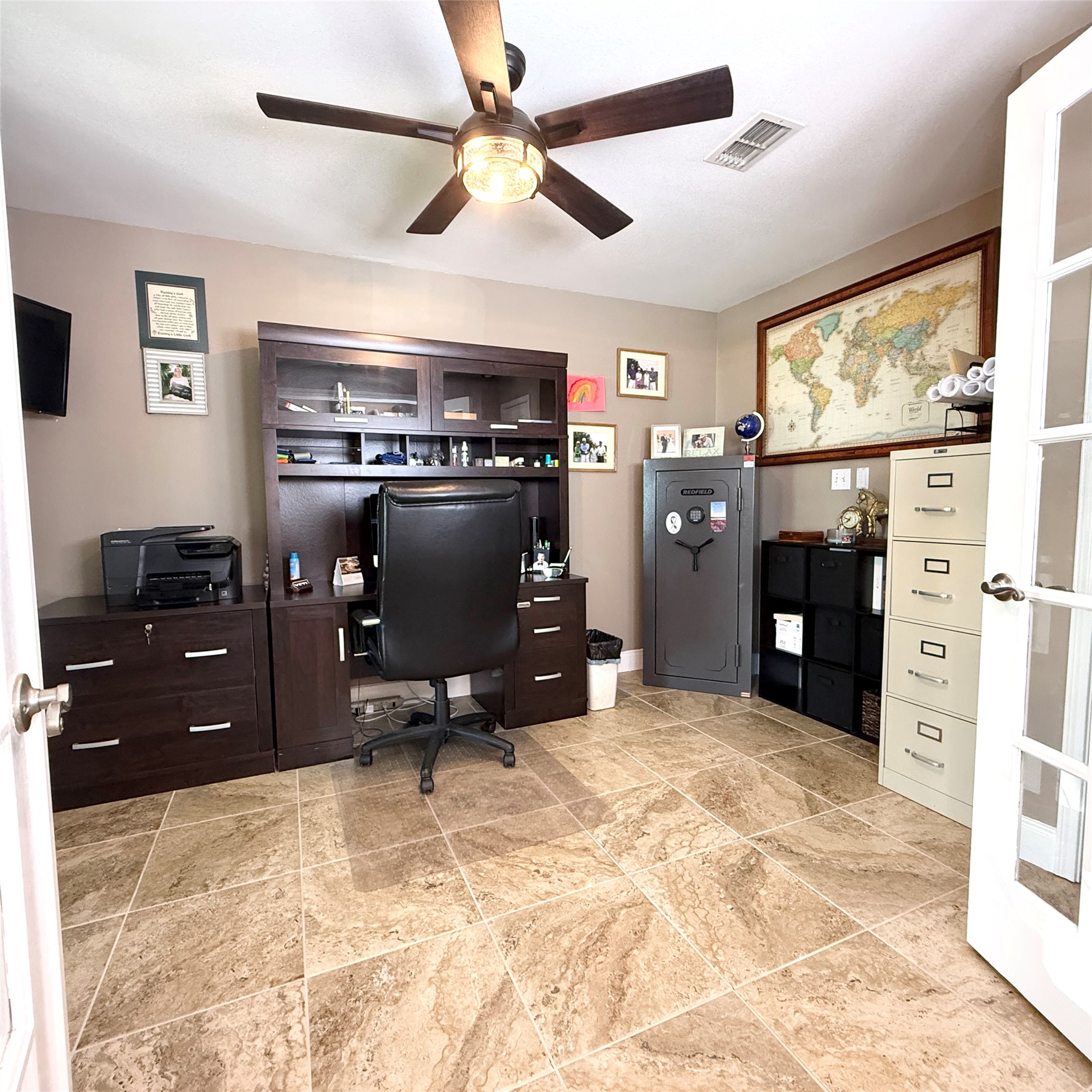 1902 Rowe Loop Pflugerville, TX 78660 - Photo 38 of 38 Office area with a ceiling fan and light stone finish flooring