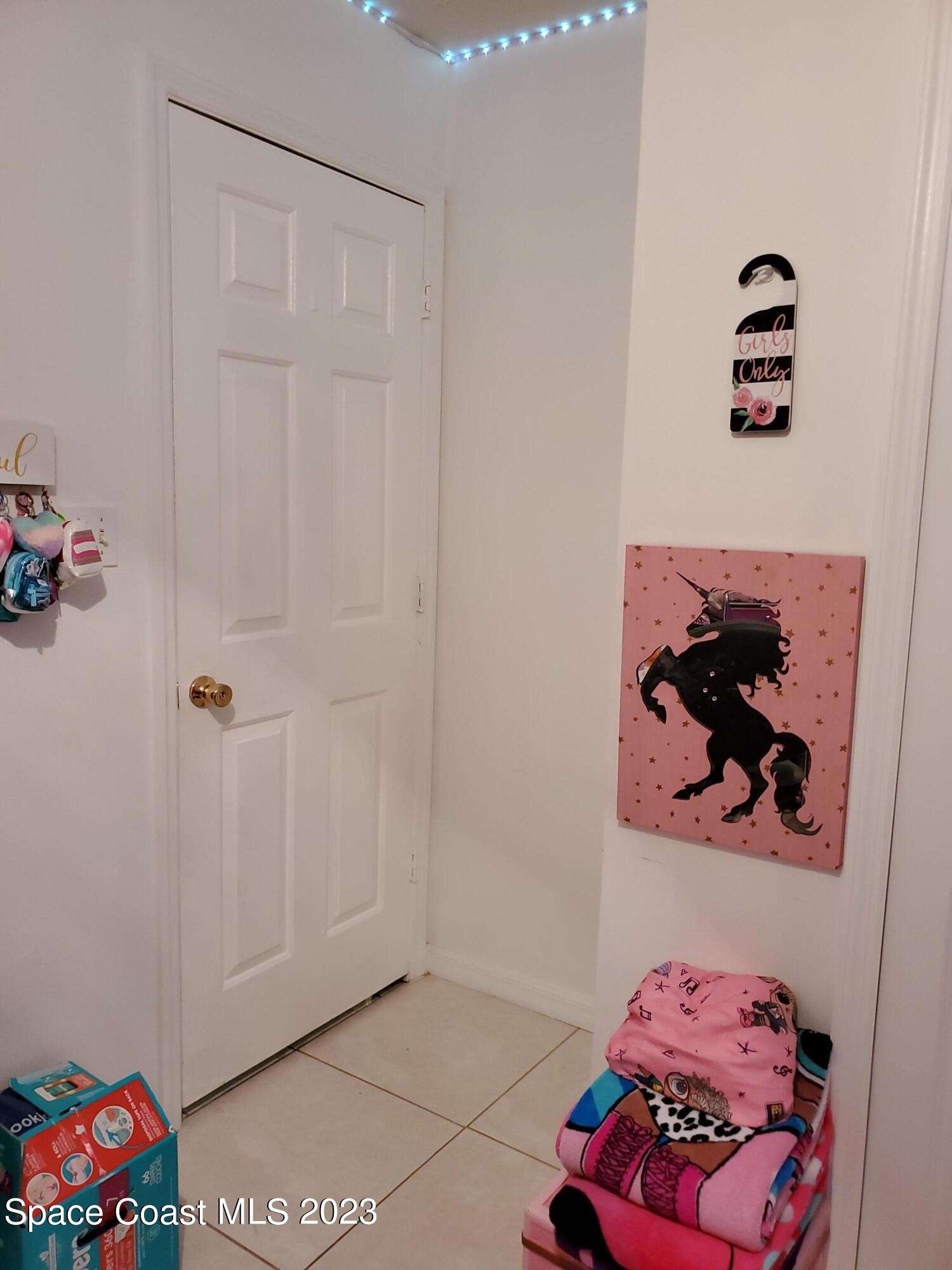 6845 Spring Street Cocoa, FL 32927 - Photo 29 of 45 a room with toys and dresser